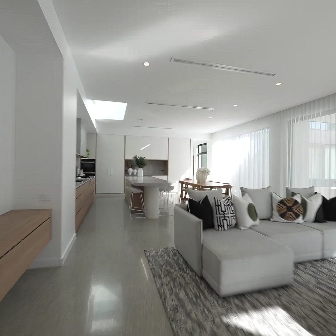 living-room-with-white-couch-rug-floor